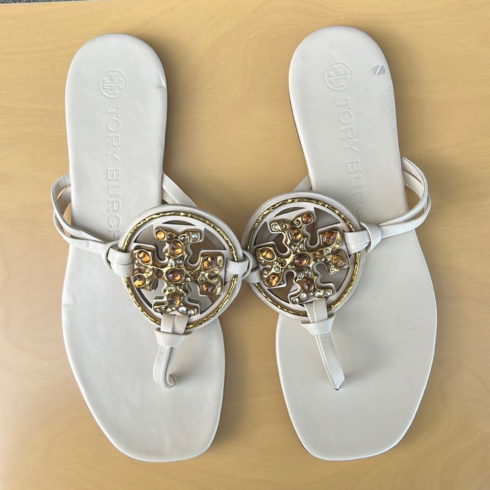 Cream Tory Burch Sandal - amber/gold beading. Leather sole. Small blue stain.